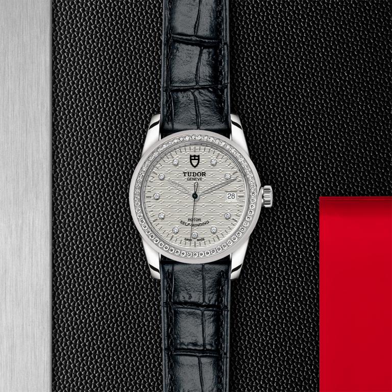 TUDOR Glamour Date slide 1
