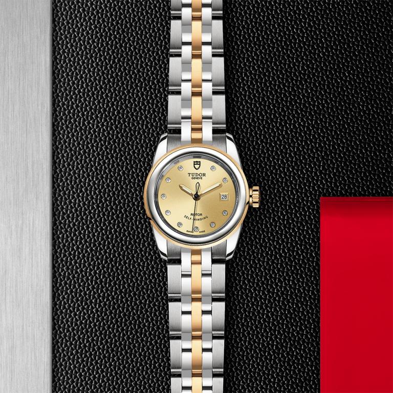 TUDOR Glamour Date slide 1