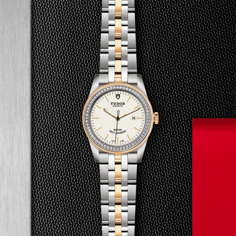 TUDOR Glamour Date slide 1