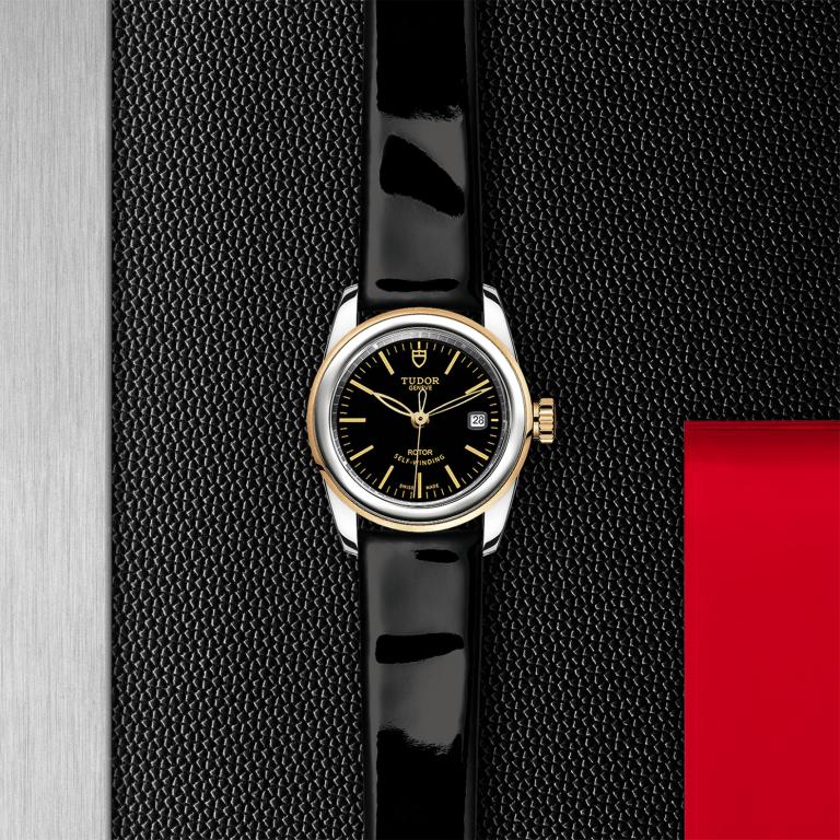 TUDOR Glamour Date slide 1