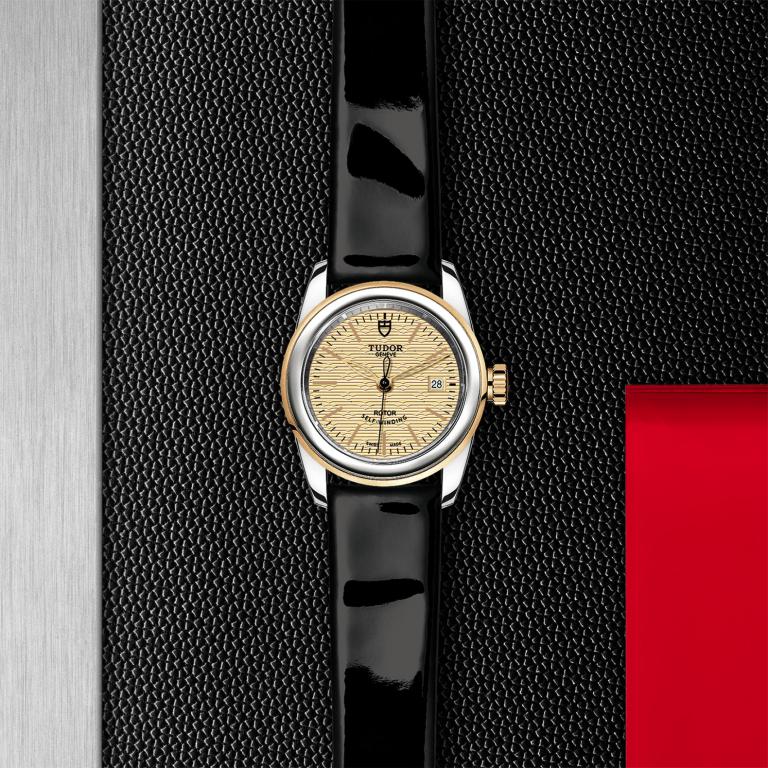 TUDOR Glamour Date slide 1