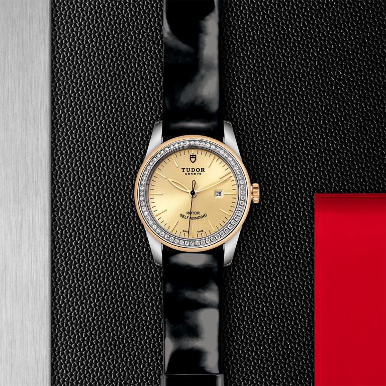 TUDOR Glamour Date slide 1