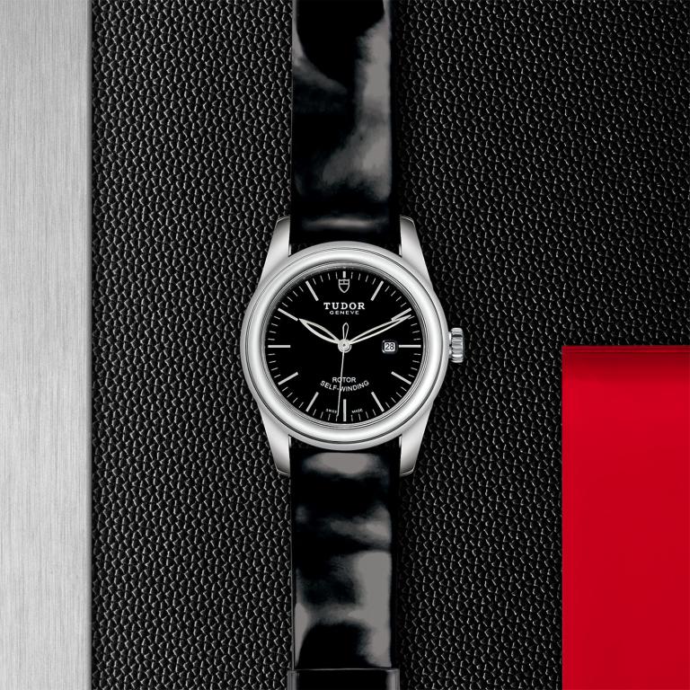 TUDOR Glamour Date slide 1