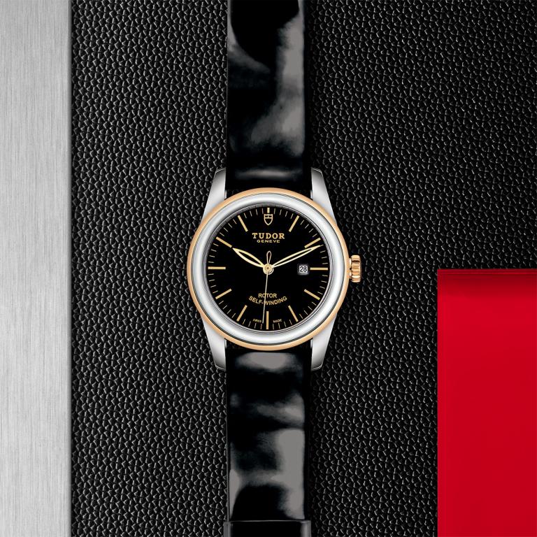 TUDOR Glamour Date slide 1