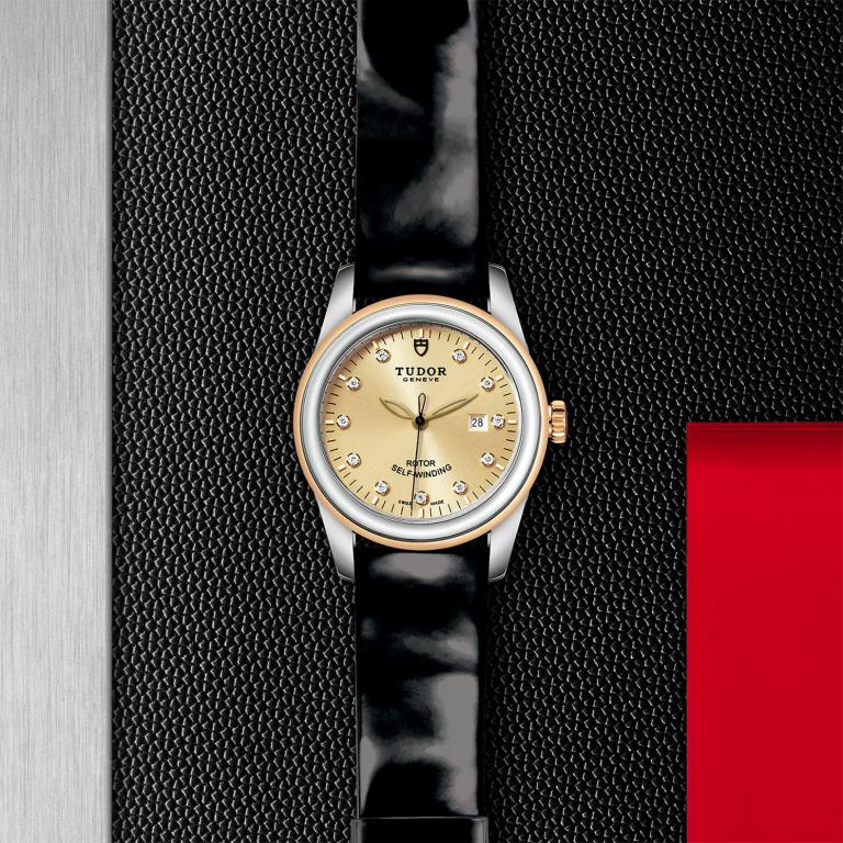 TUDOR Glamour Date slide 1