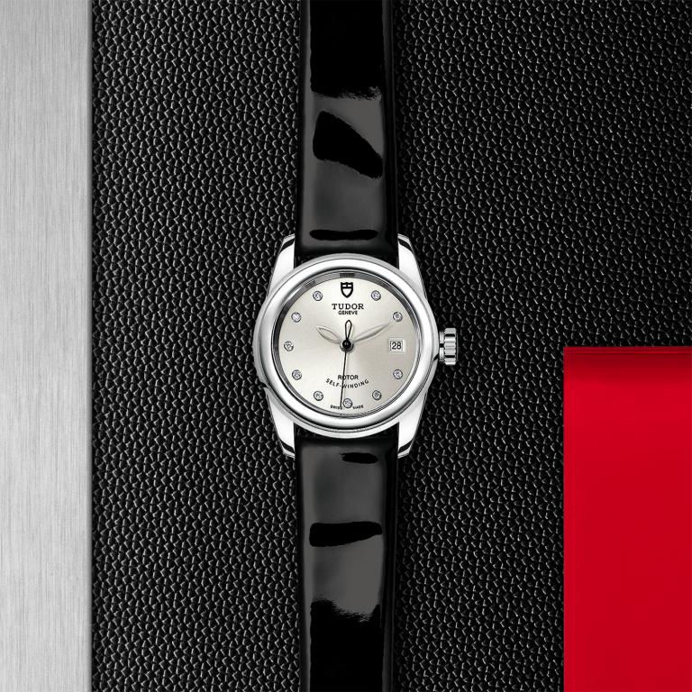 TUDOR Glamour Date slide 1