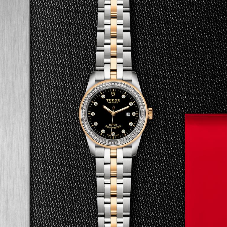 TUDOR Glamour Date slide 1