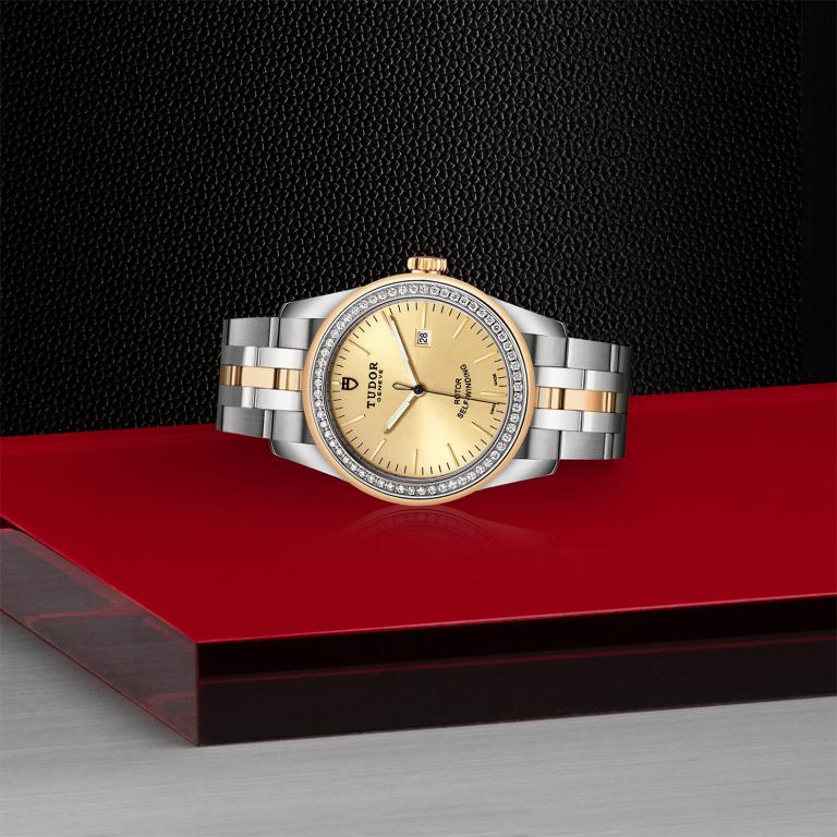 TUDOR Glamour Date slide 1