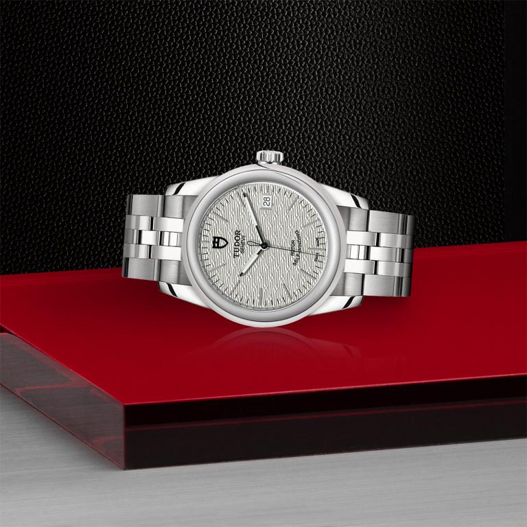 TUDOR Glamour Date slide 1