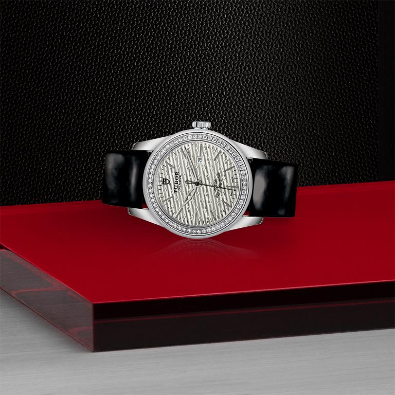 TUDOR Glamour Date slide 1