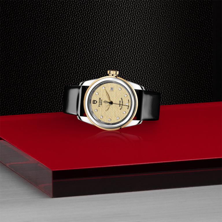 TUDOR Glamour Date slide 1