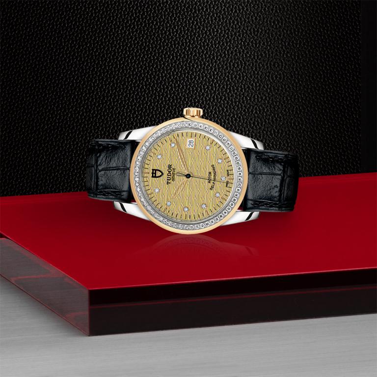 TUDOR Glamour Date slide 1