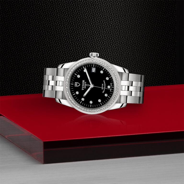 TUDOR Glamour Date slide 1