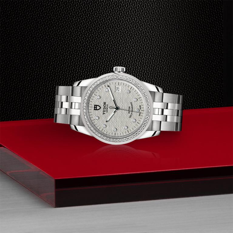 TUDOR Glamour Date slide 1