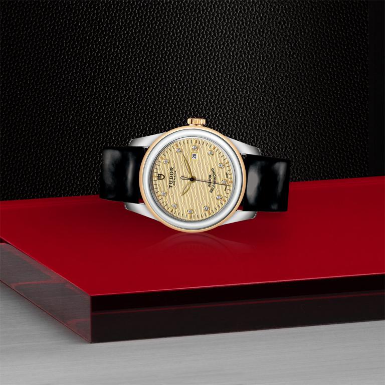 TUDOR Glamour Date slide 1