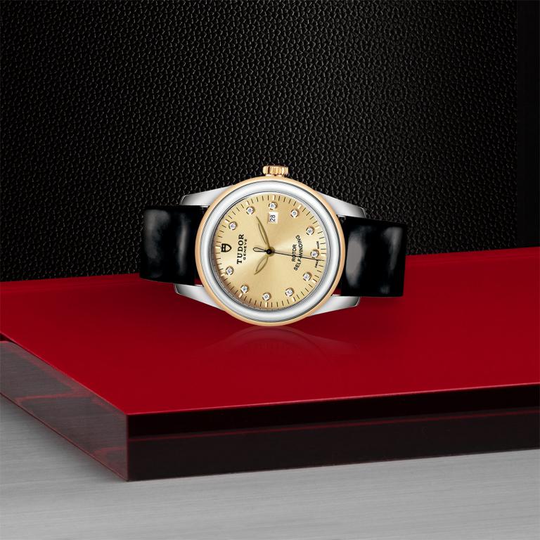 TUDOR Glamour Date slide 1