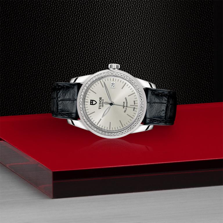 TUDOR Glamour Date slide 1