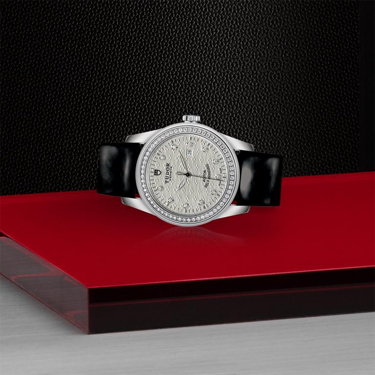 TUDOR Glamour Date slide 1