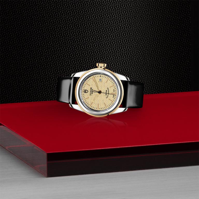 TUDOR Glamour Date slide 1