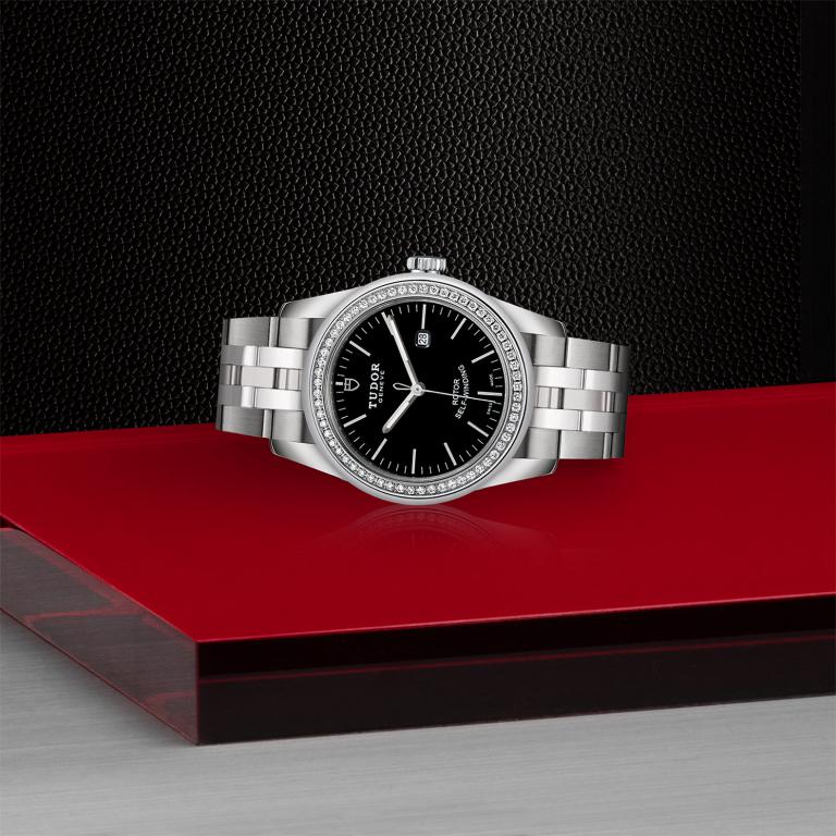 TUDOR Glamour Date slide 1