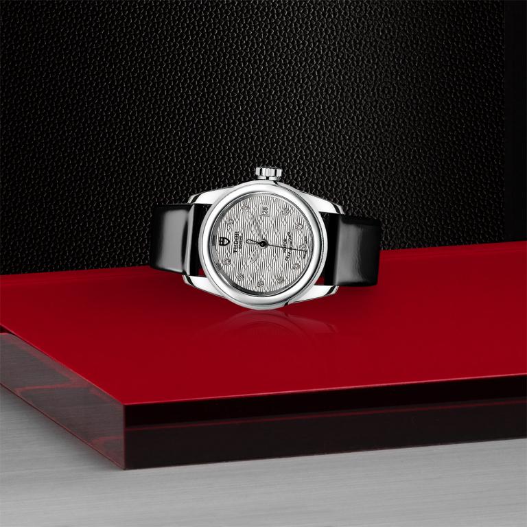 TUDOR Glamour Date slide 1