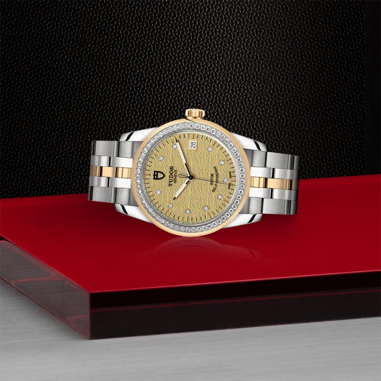 TUDOR Glamour Date slide 1