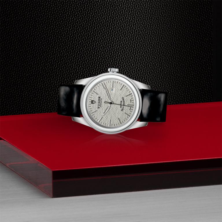 TUDOR Glamour Date slide 1