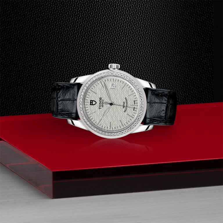 TUDOR Glamour Date slide 1