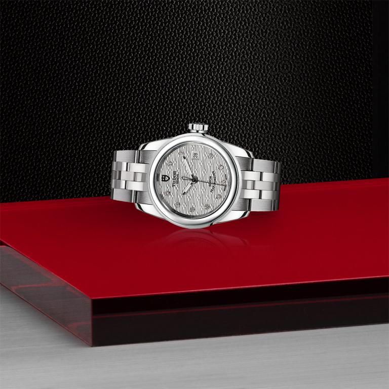 TUDOR Glamour Date slide 1