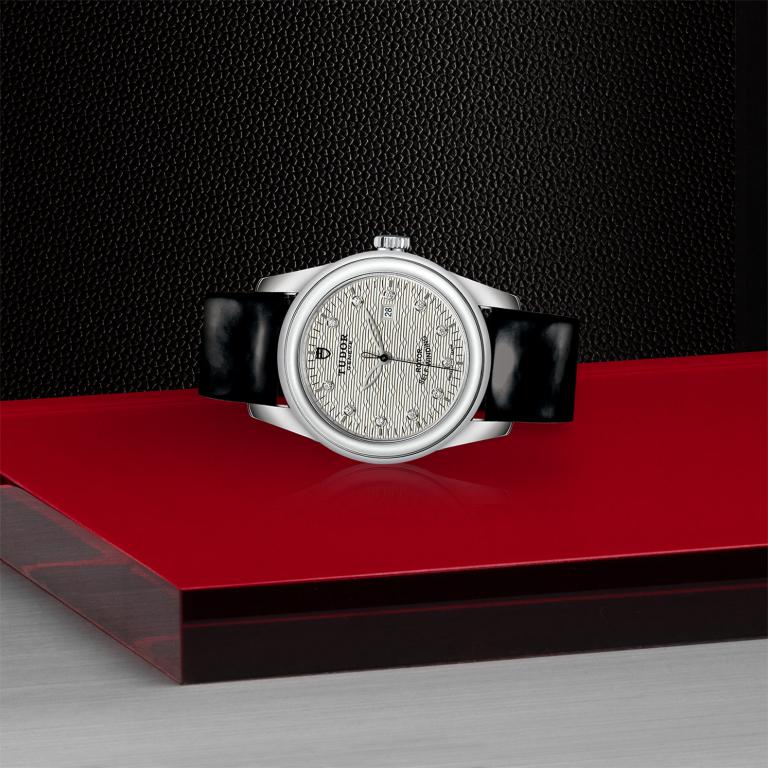TUDOR Glamour Date slide 1