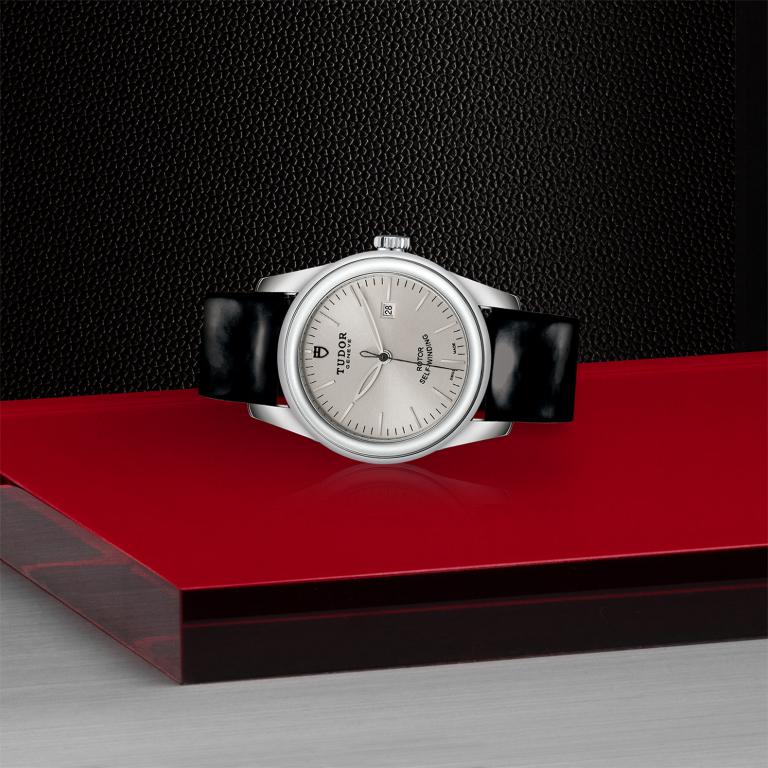 TUDOR Glamour Date slide 1