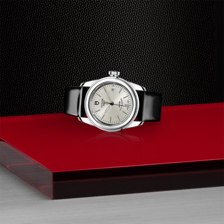 TUDOR Glamour Date slide 1
