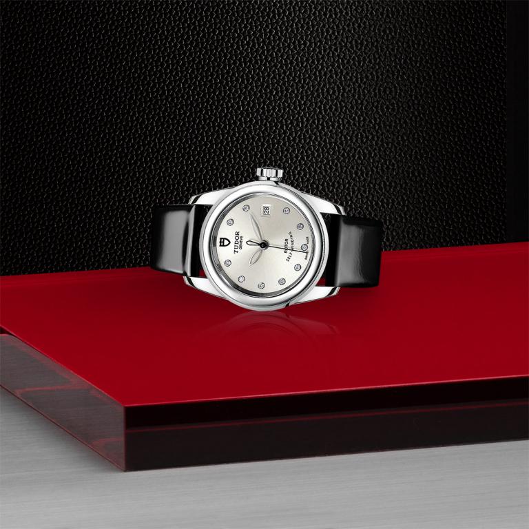 TUDOR Glamour Date slide 1