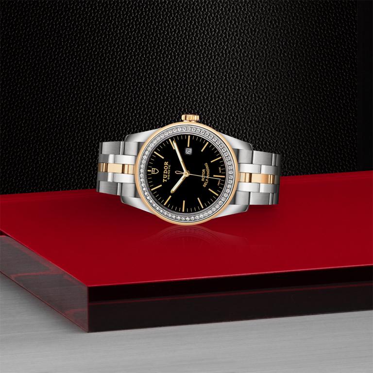 TUDOR Glamour Date slide 1
