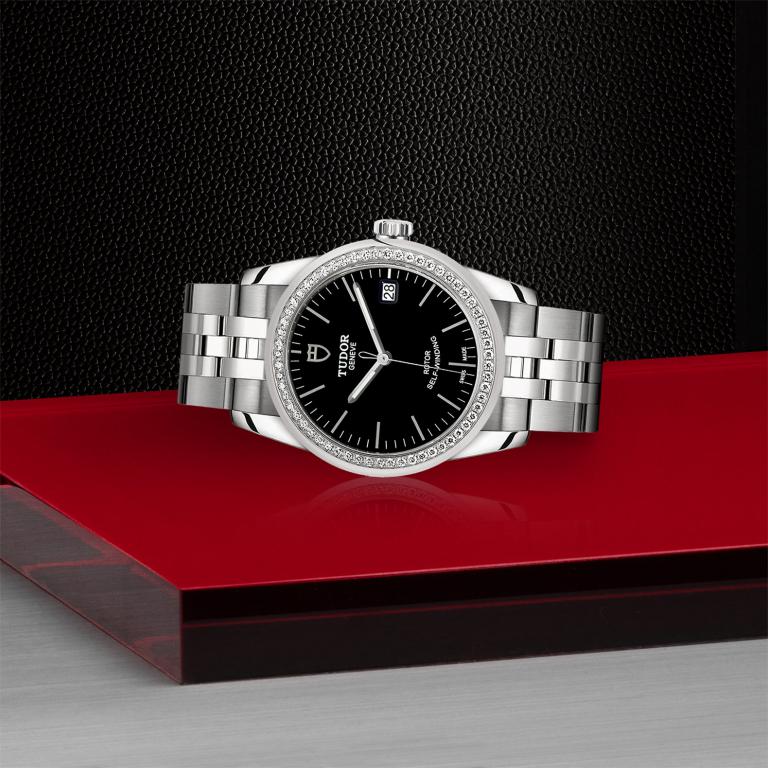 TUDOR Glamour Date slide 1
