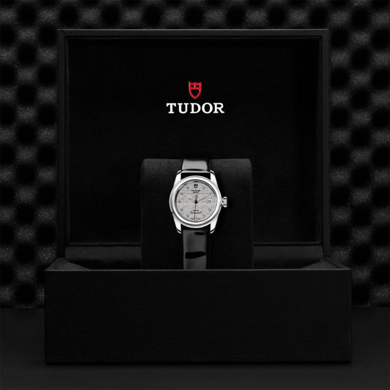 TUDOR Glamour Date slide 1
