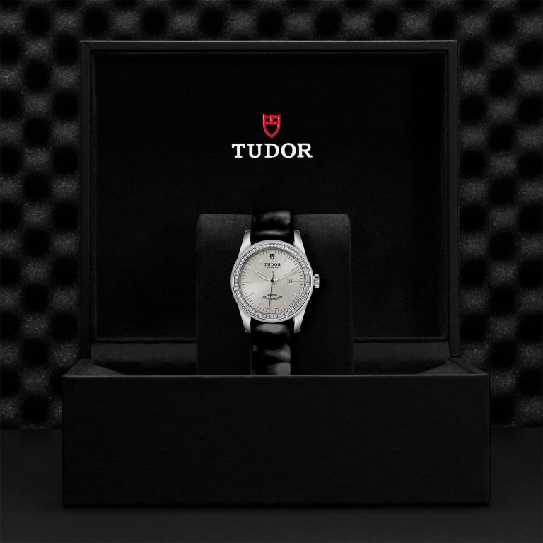TUDOR Glamour Date slide 1