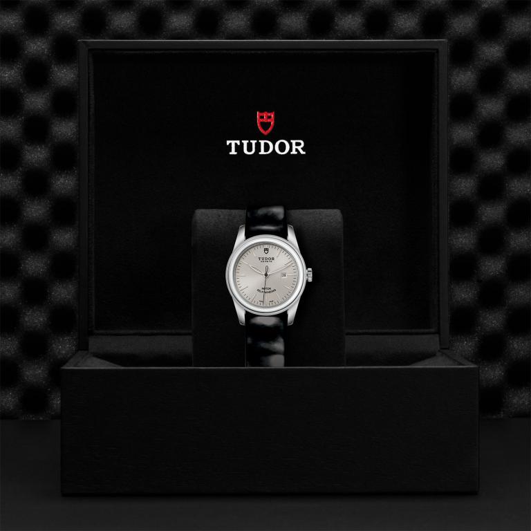 TUDOR Glamour Date slide 1