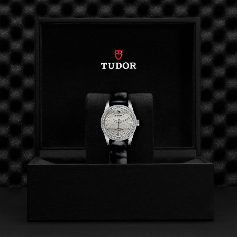 TUDOR Glamour Date slide 1