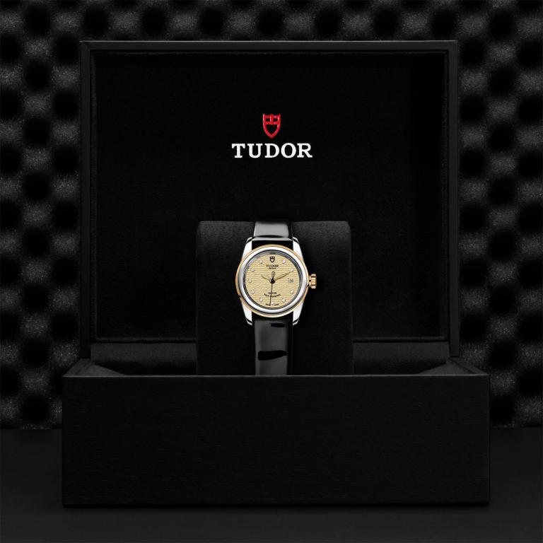 TUDOR Glamour Date slide 1